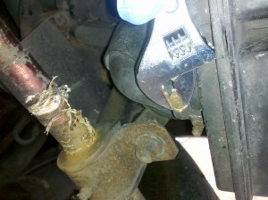 loosen the hose clamps from the rubber lines connecting to the charcoal filter, 2004 Subaru Impreza WRX